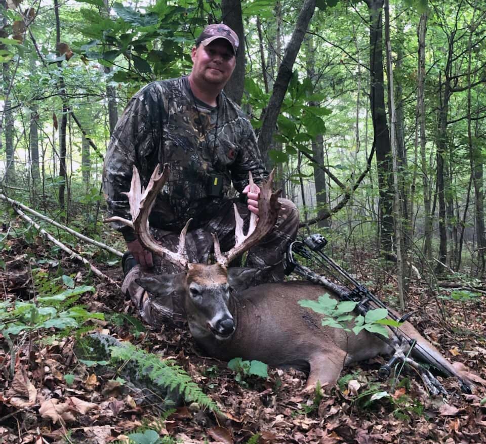 Another happy hunter with a beautiful Whitetail Deer Buck